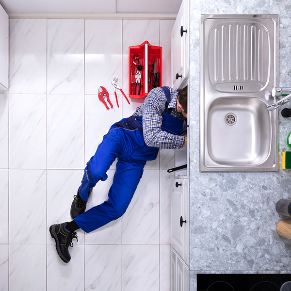 Plumber Repairing Sink Pipe Sink Plumbing Installation Services | Mr. Plumber Expert